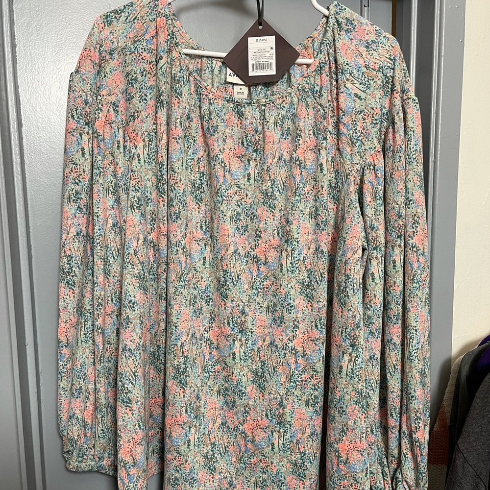 Brand new with tags. Ava & Viv shirt size 1x or 14w.